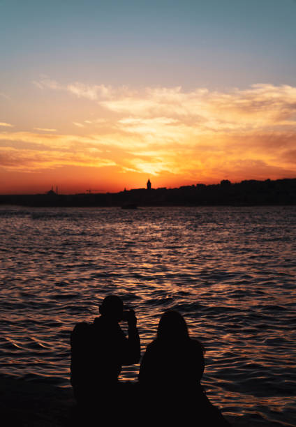 istock Happy couple on the bosphorus on background colorful sunset 1140749523