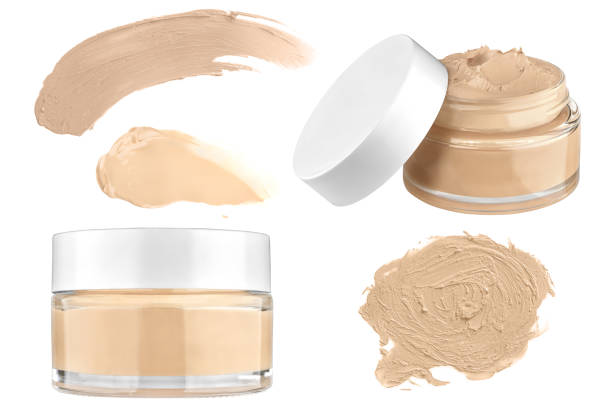 Luxury glass face make-up creme foundation open and closed container and four round color samples, isolated on white background, clipping paths included