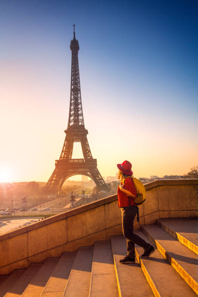 Tourist exploring Eiffel Tower Paris France stock photo