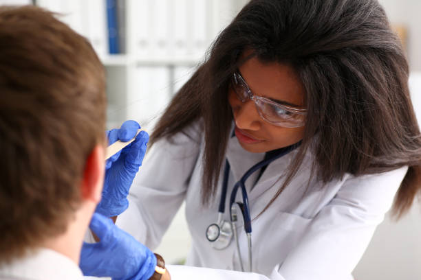 istock Beautiful black smiling female doctor talk with 1140751297