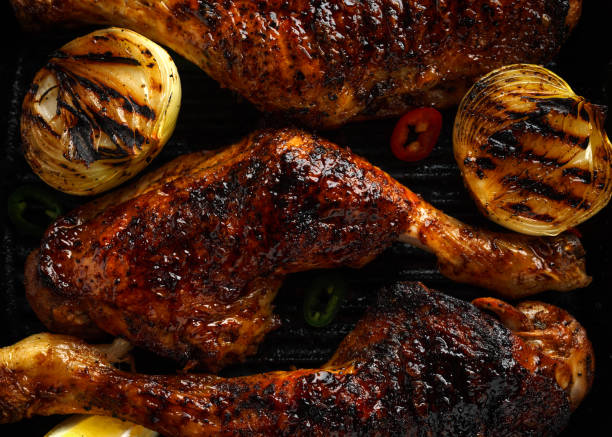 istock Grilled chicken legs with lemon in cast iron skillet 1140752596
