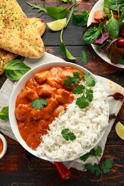 istock Chicken tikka masala curry with rice and naan bread 1140752851