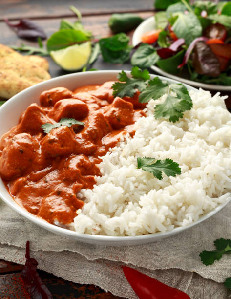 istock Chicken tikka masala curry with rice and naan bread 1140752863
