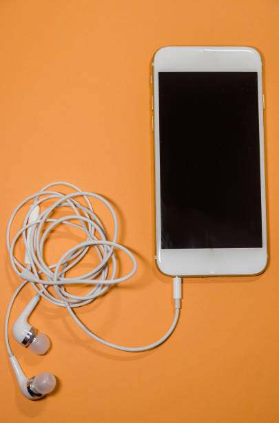 istock a phone with usb cable and headphones 1140755971