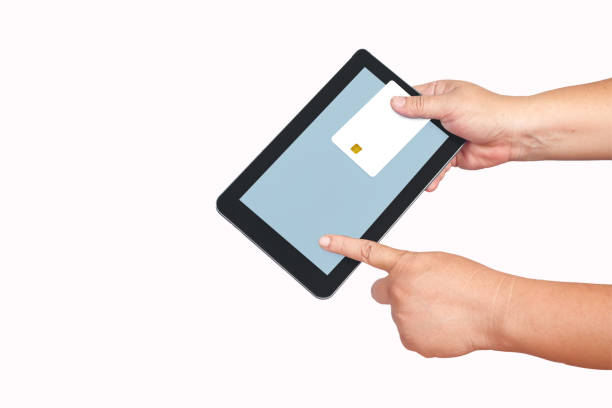 istock Credit card or debit card and tablet in hand,E money concept. 1140756089