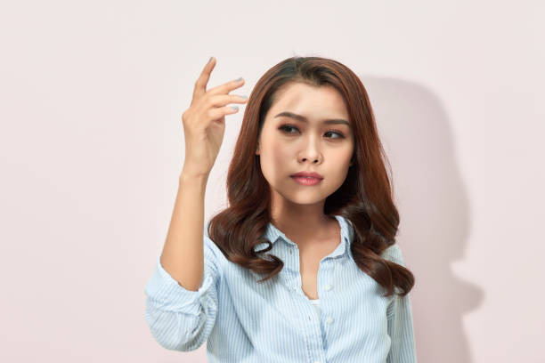 istock Asian woman hands covering her eyes from bright sunlight 1140757172