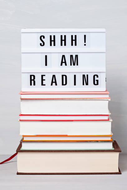 istock Heap of books and light box 1140759955