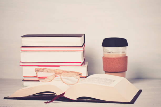 istock Books, cup of coffee, reading glasses 1140759959