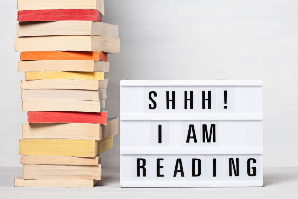 istock Heap of books and light box 1140759962