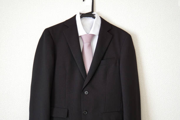 istock Black business suit and pink tie. 1140760048