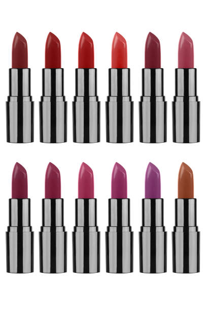 istock Twelve different colors lipstick samples in open black tubes with metallic reflections, isolated on white background, clipping paths included 1140760185