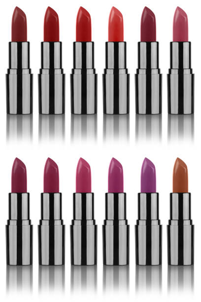 istock Twelve different colors lipstick samples in open black tubes with metallic reflections, reflected on the surface, isolated on white background, clipping paths included 1140760203