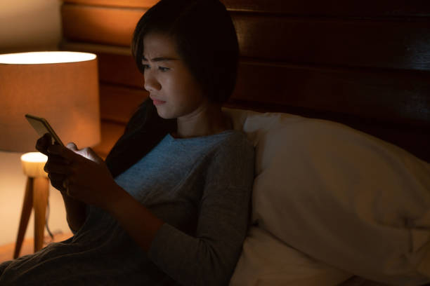 istock woman browsing online before sleeping at home 1140762148