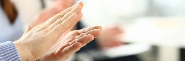 istock Group of people clap their arm in row during seminar 1140762616