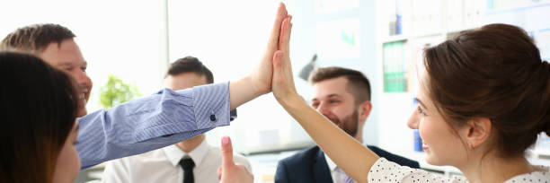 istock Group of joyful smiling happy people celebrate 1140762633