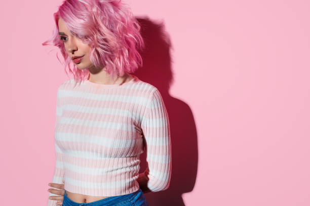 istock Sensual modern woman with pink hairstyle 1140764349