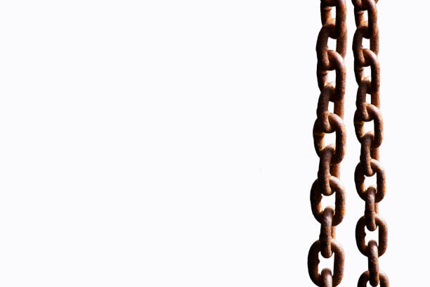 istock Rusty Steel chain hanging with iron beam in construction area 1140768561