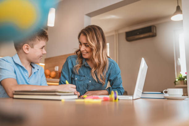 istock Boy and teacher at home 1140773504