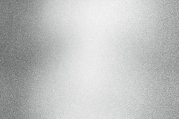 istock Abstract texture background, light shining on rough silver steel wall 1140774049