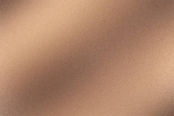 istock Abstract texture background, light shining on rough bronze metal wall 1140774051