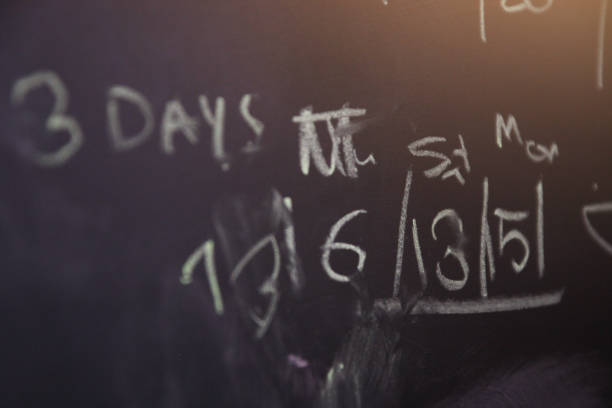 istock Mathematics write by hand with chalk on a blackboard in classroom. Back to school concept. 1140775013