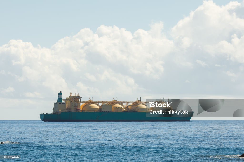 liquefied natural gas LNG transportation tanker ship, blue sea and sunny sky background liquefied natural gas LNG transportation tanker ship, blue sea and sunny sky background with copy-space Liquefied Natural Gas Stock Photo
