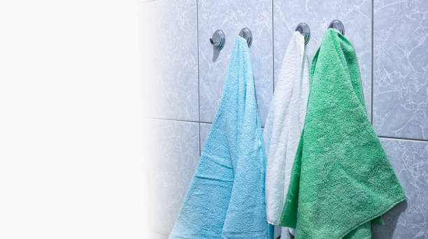 istock Towels in the bathroom on the hook 1140778399