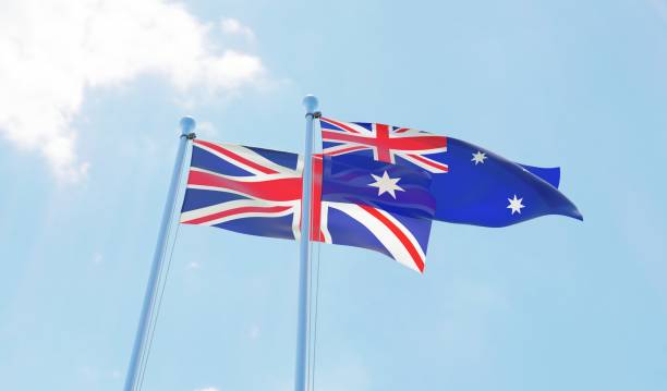 istock UK and Australia, two flags waving against blue sky 1140779299