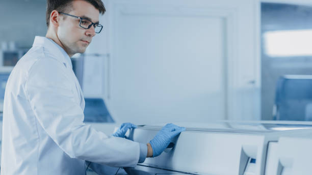 istock Research Scientist Works Blood Analyzing Machine. Innovative Pharmaceutical Lab with Modern Medical Equipment Doing Genetics Research. 1140779700