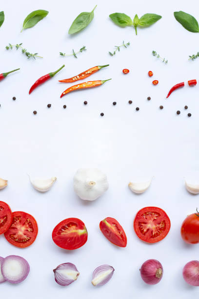 istock Various fresh vegetables and herbs on white background. Healthy eating concept 1140780779
