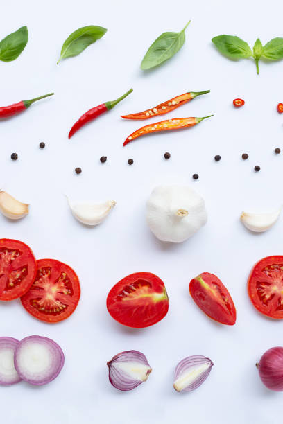 istock Various fresh vegetables and herbs on white background. Healthy eating concept 1140780794