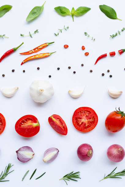 istock Various fresh vegetables and herbs on white background. Healthy eating concept 1140781313