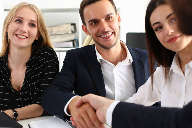 istock Man in suit shake hand as hello in office closeup 1140782069