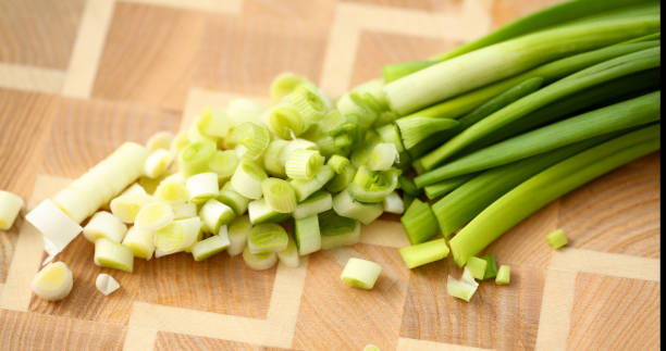 istock Cook holds knife in hand and cuts on cutting 1140783222