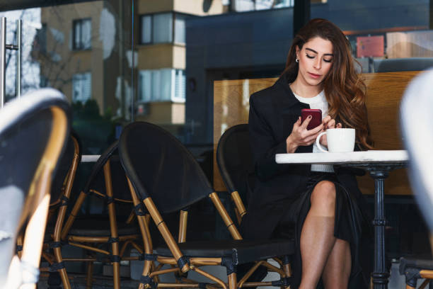 istock Successful businesswoman working at cafe 1140783929