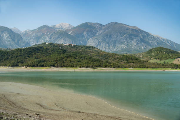 Lake Campotosto embedded in the Gran Sasso and Monti della Laga National Park Lake Campotosto embedded in the Gran Sasso and Monti della Laga National Park, Abruzzo, Italy amatrice stock pictures, royalty-free photos & images
