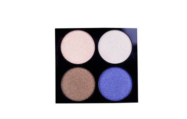 istock Set of four round eye shadow in a plastic black box isolated on white background 1140786701