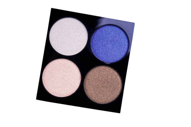 istock Set of four round eye shadow in a plastic black box isolated on white background 1140786702