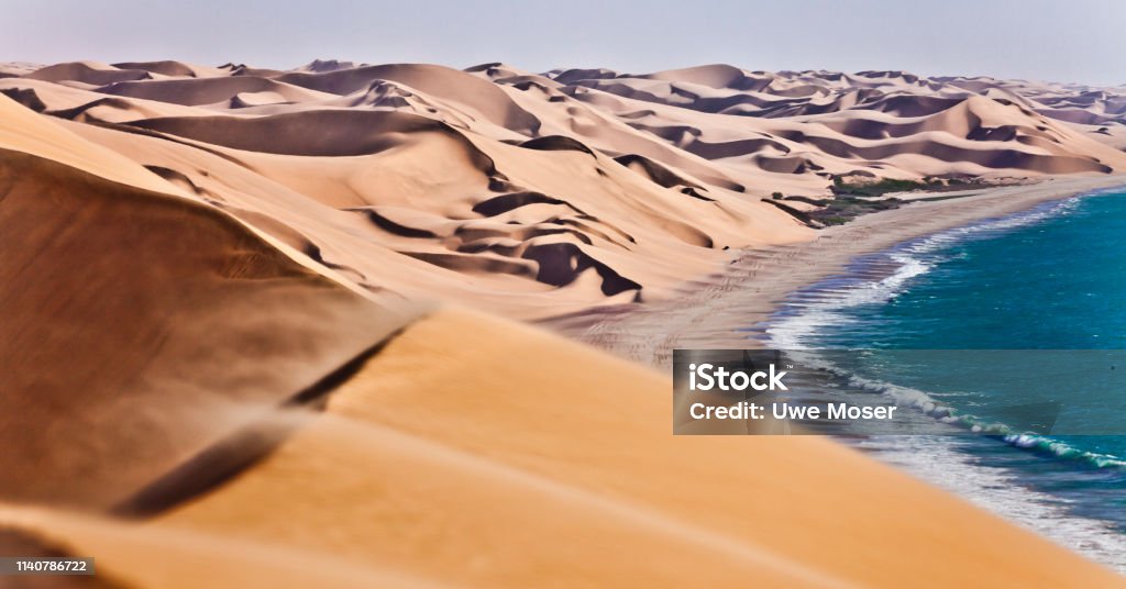 Dunes in Namib desert The Namib desert along side the atlantic ocean, southern Africa, Namibia Desert Area Stock Photo