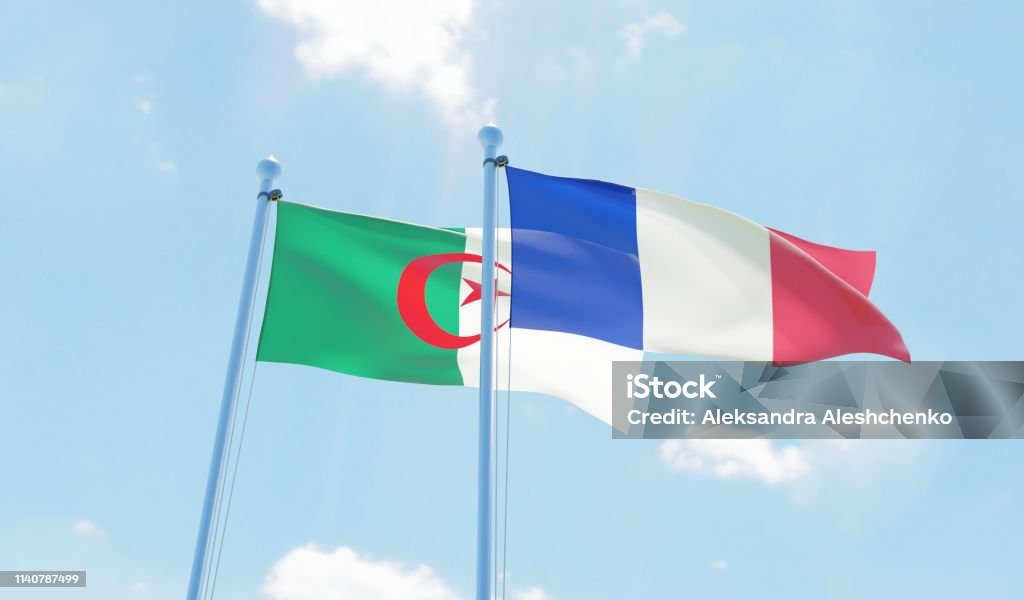 France and Algeria, two flags waving against blue sky France and Algeria, two flags waving against blue sky. 3d image Algeria Stock Photo