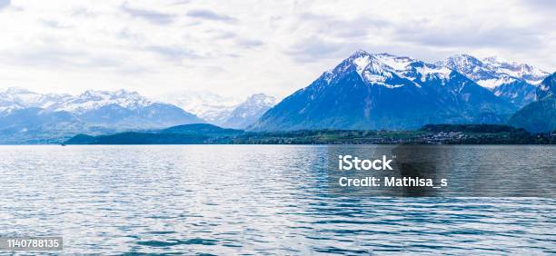 Niesen Kulm And Lake Thun In Fornt Of Alps Mountain In Bern Switzerland Stock Photo - Download Image Now