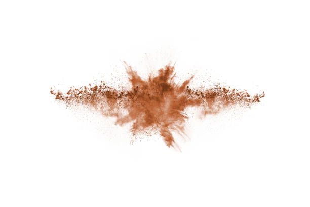 istock Brown color powder explosion on white background. Colored cloud. Colorful dust explode. Paint Holi. 1140788249
