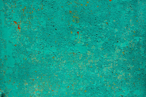 istock Texture of old rusty metal, painted blue-green with peeling paint and cracks. Horizontal texture of cracked paint on rusty steel 1140791390