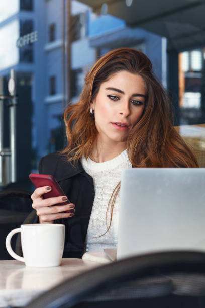 istock Successful businesswoman working at cafe 1140791403