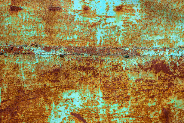 istock Texture of old rusty metal, painted green which became orange from rust. 1140792325