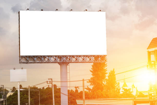 istock blank white billboard at sunset - can advertisement for display or montage text free space product and business. 1140794973