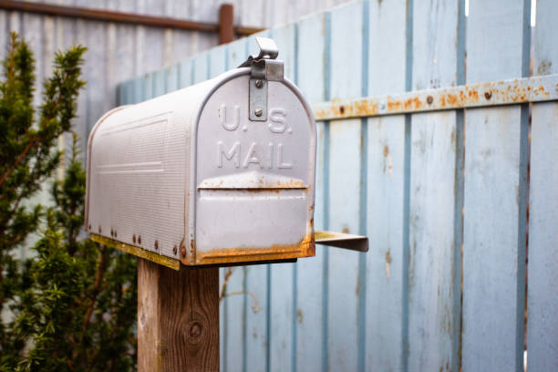 istock classic mail box near the house 1140797082