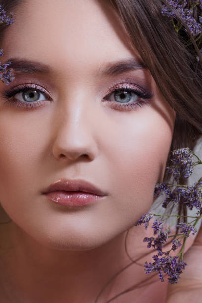 istock Attractive blue-eyed brunette with a gentle spring image 1140797200