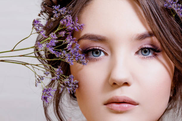 istock Attractive blue-eyed brunette with a gentle spring image 1140797202