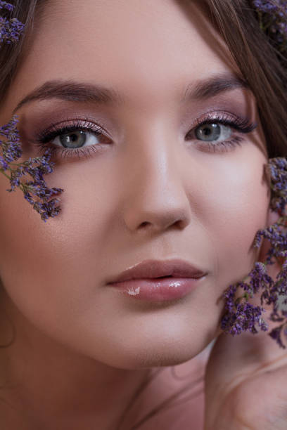 istock Attractive blue-eyed brunette with a gentle spring image 1140797203